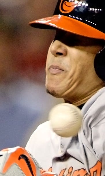 Machado homers, gets plunked as O's top fading Nationals